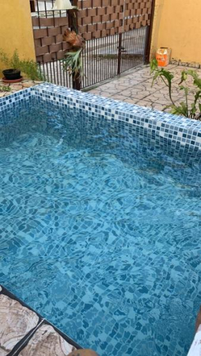 Casa ampla com piscina 4 quadras da praia , Espaço gourmet churrasqueira